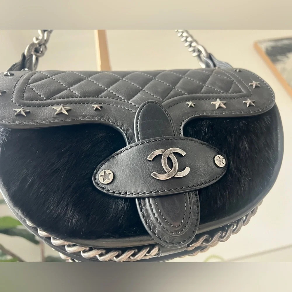 CHANEL Black Quilted & Fur Star-Studded Saddle Bag